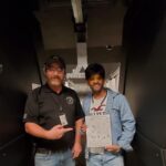 Student with shooting instructor